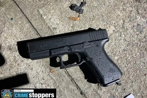 A black handgun recovered at the scene of a shooting in Brooklyn.